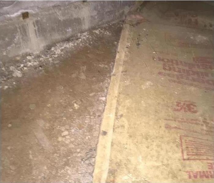 crawlspace cleaned up with lime spread on ground